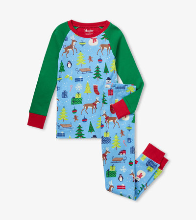 Pyjama avec haut à manches raglan pour enfant – Matin de Noël sur fond bleu