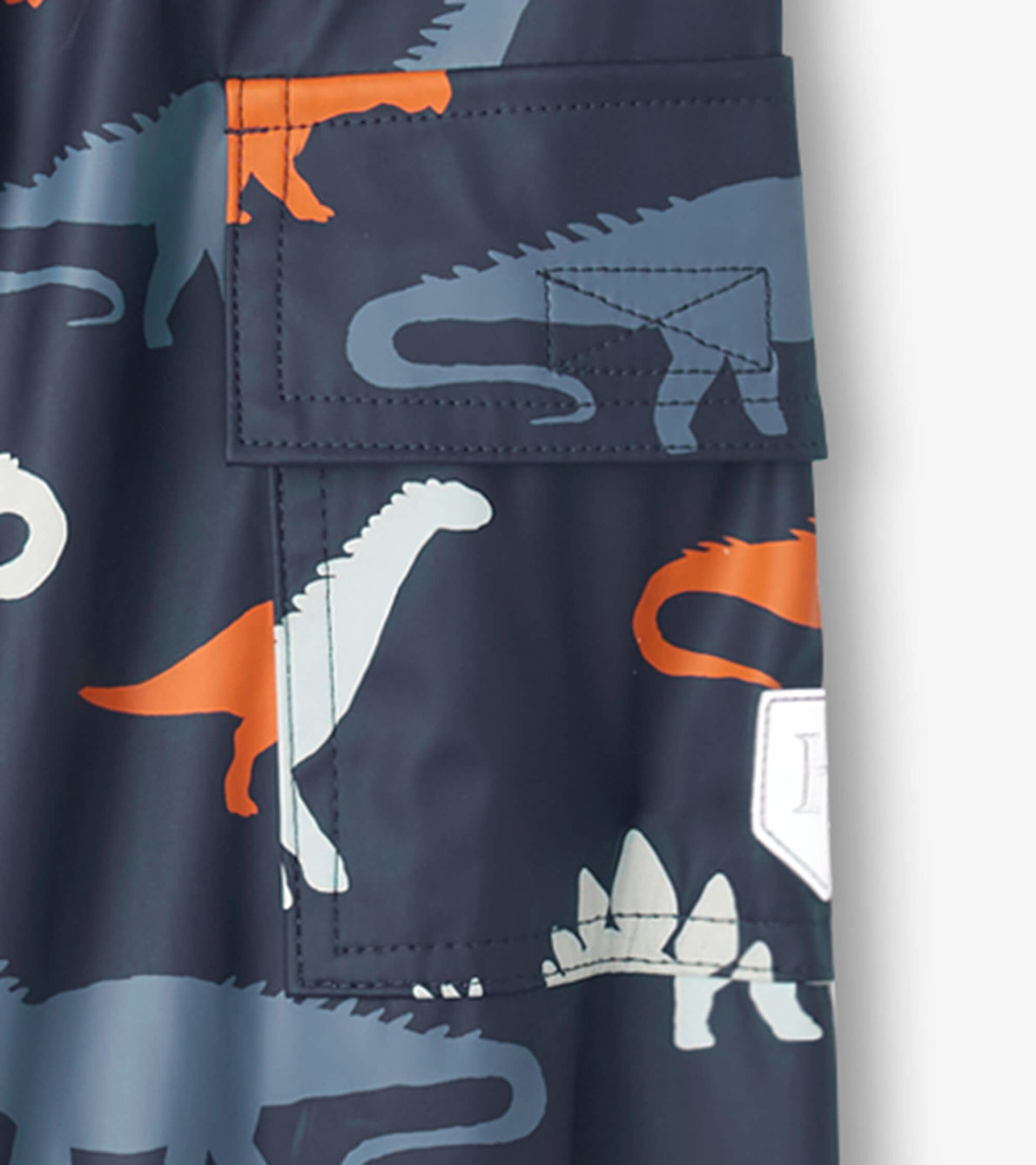 Agrandir l'image de Pantalon de pluie à couleur changeante pour enfant – Silhouettes de dinosaures
